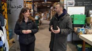 Zack Polanski speaks to Sky's Alexandra Rogers in a volunteer warehouse in Calais